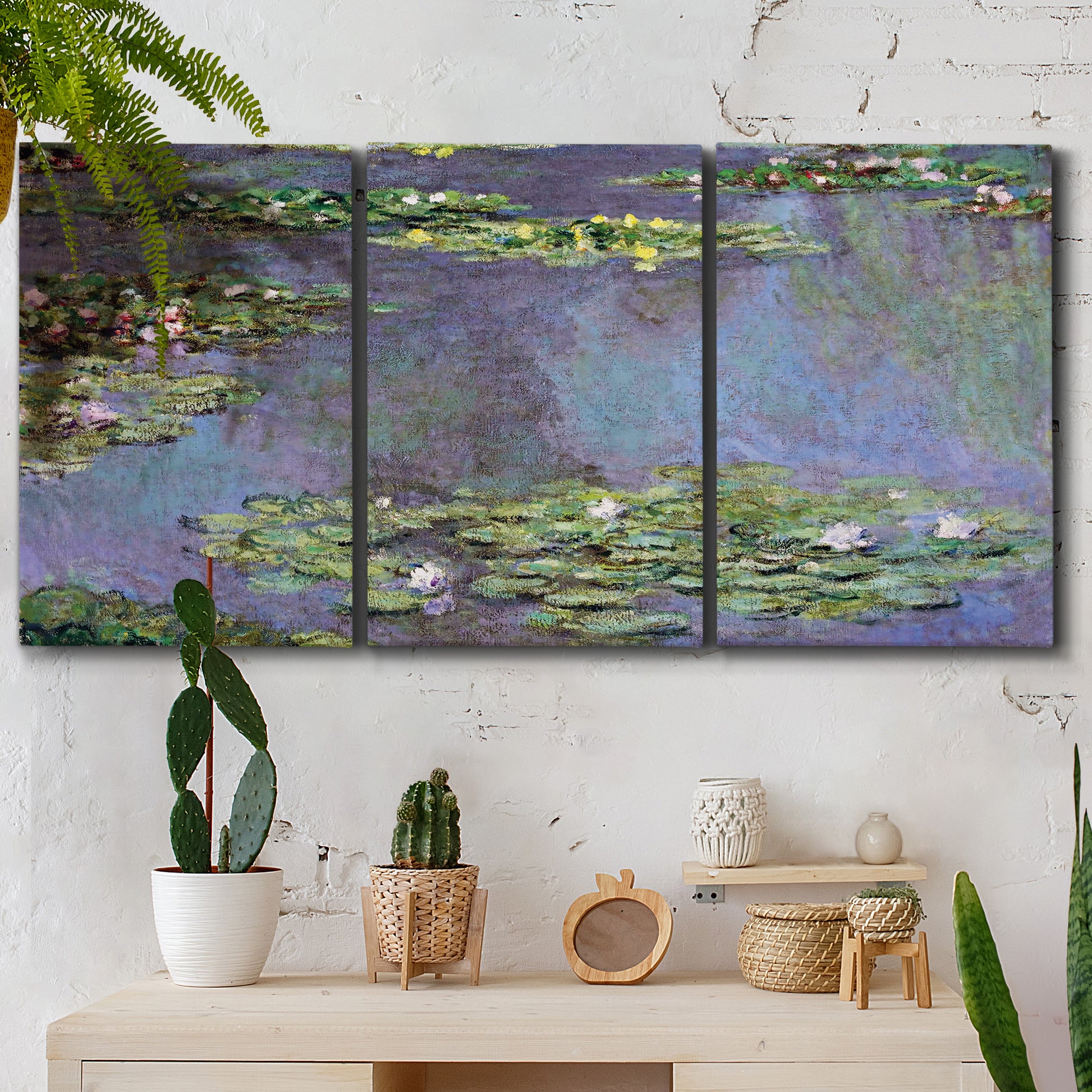 Three-panel canvas wall art featuring purple haze water lily pond, displayed in a boho-chic entryway above a console table.