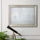 Impressionist atmospheric landscape in morning haze by Claude Monet in an ornate champagne frame displayed in a light-toned interior setting.