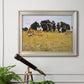 Impressionist rural harvest scene by John Singer Sargent in an ornate champagne frame displayed in a light-toned interior setting.