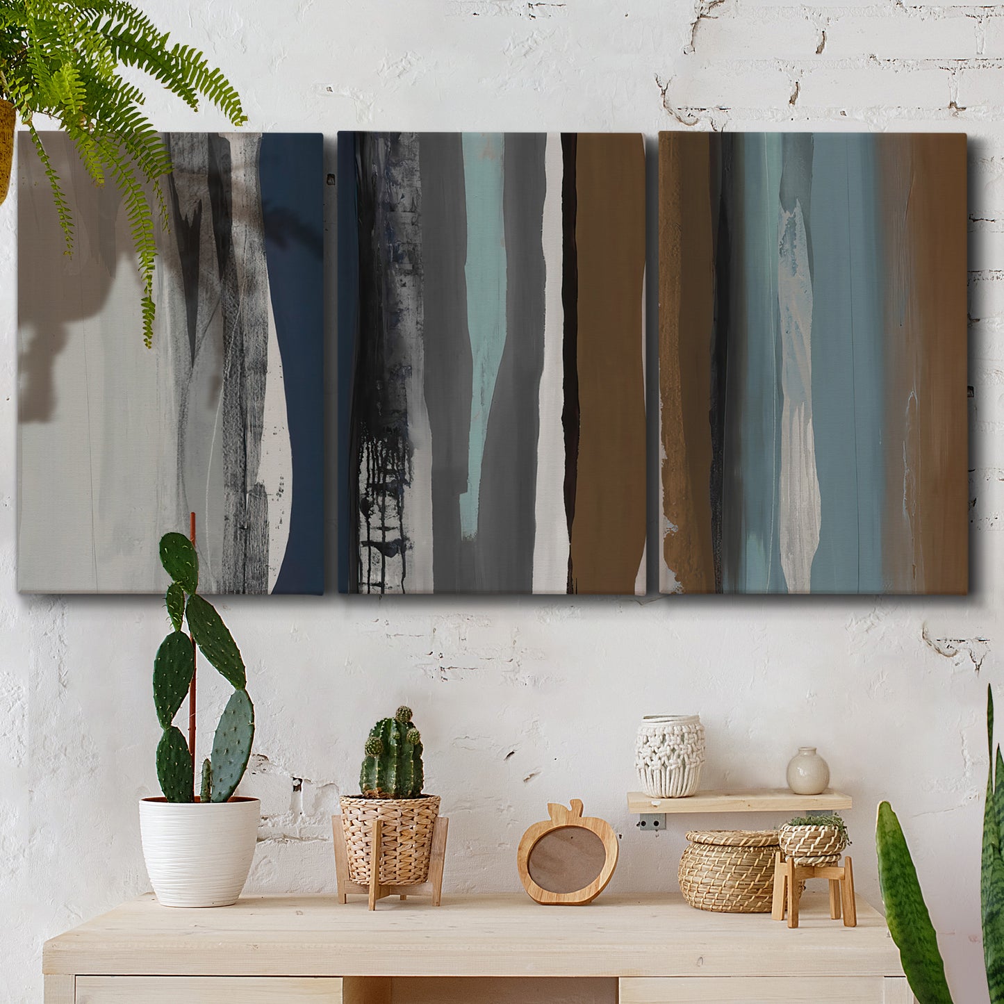 Three-panel canvas wall art featuring layered abstract amusement park tones, displayed in a boho-chic entryway above a console table.
