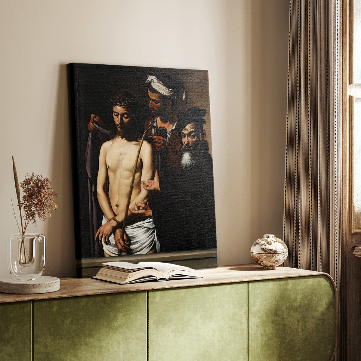 Canvas art print of a religious composition with figures in strong shadow and contrast styled in a home decor setting.