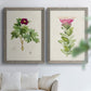 Set of two gray barnwood framed canvas prints depicting peonies thistles leafy stems and archival cream paper arranged across two complementary compositions above a sofa in a bright living space.