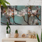 Three-panel canvas wall art featuring dogwood blossoms in spring photograph, displayed in a boho-chic entryway above a console table.