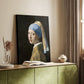 Canvas art print of a close-up figure with dark background and luminous skin tones styled in a home decor setting.