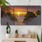 Three-panel canvas wall art featuring sunlit tropical path through greenery, displayed in a boho-chic entryway above a console table.