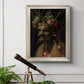 Surreal allegorical portrait representing the four seasons by Giuseppe Arcimboldo in an ornate champagne frame displayed in a light-toned interior setting.