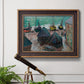Impressionist coastal beach scene with boats by Claude Monet in an ornate bronzed mahogany wood frame displayed in a light-toned interior setting.