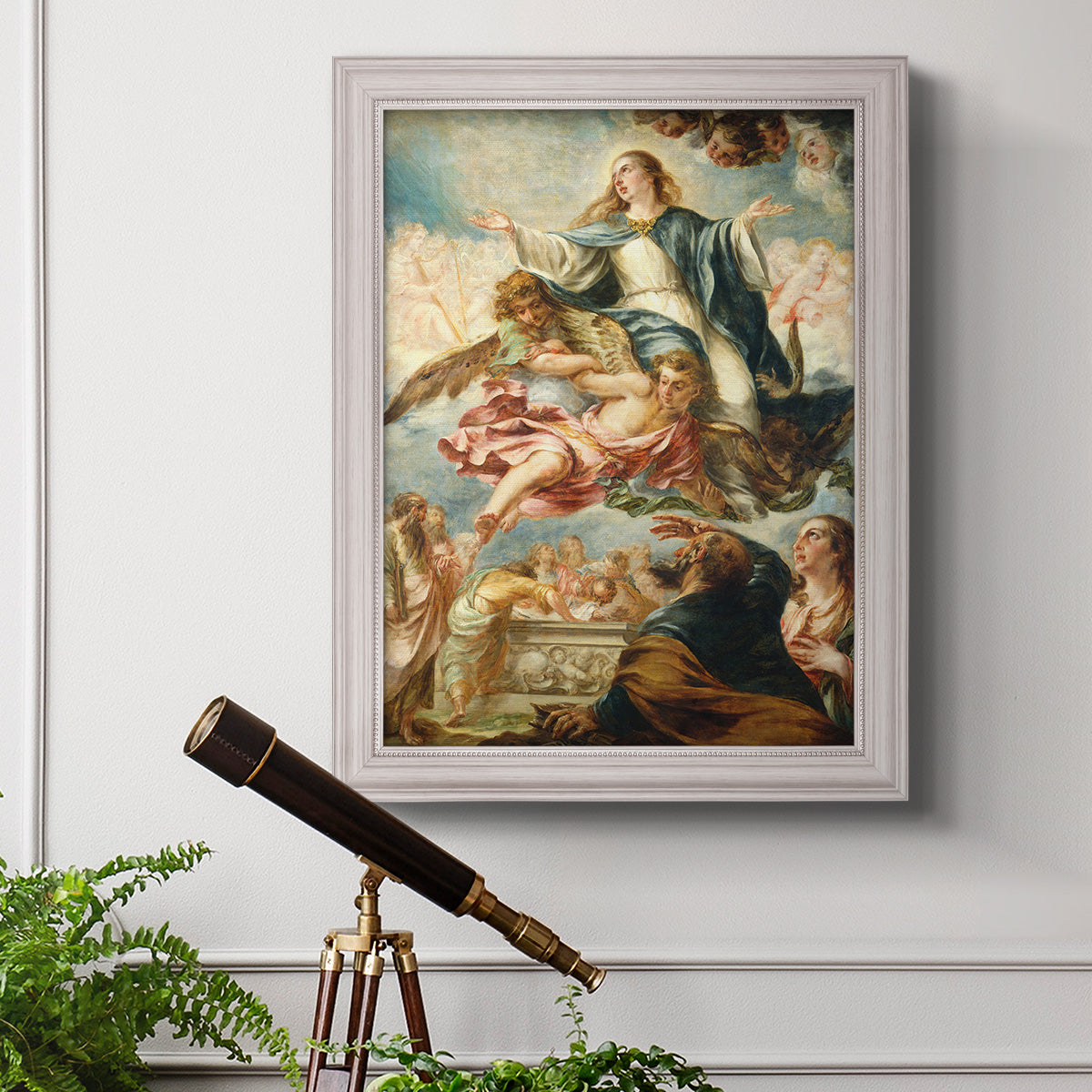 Religious painting of the Assumption of the Virgin Mary by Juan de Valdés Leal in an ornate weathered white frame displayed in a light-toned interior setting.