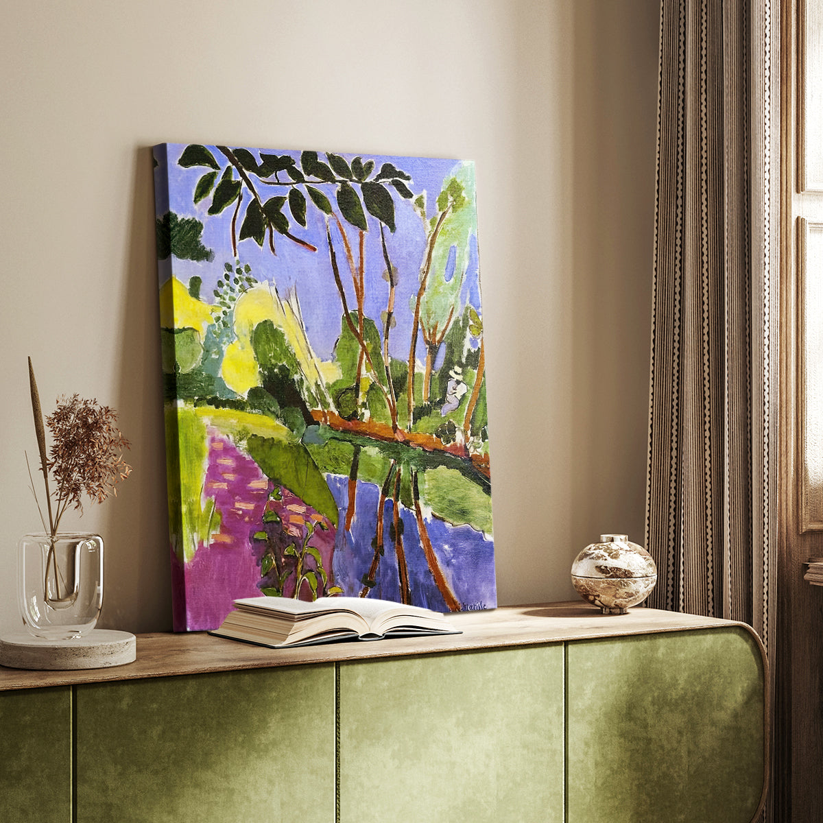 Canvas art print of a stylized outdoor scene with flowing water and vivid greens styled in a home decor setting.