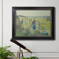 Impressionist rural hay harvest landscape by Camille Pissarro in an ornate black frame with gilded inner detail displayed in a light-toned interior setting.