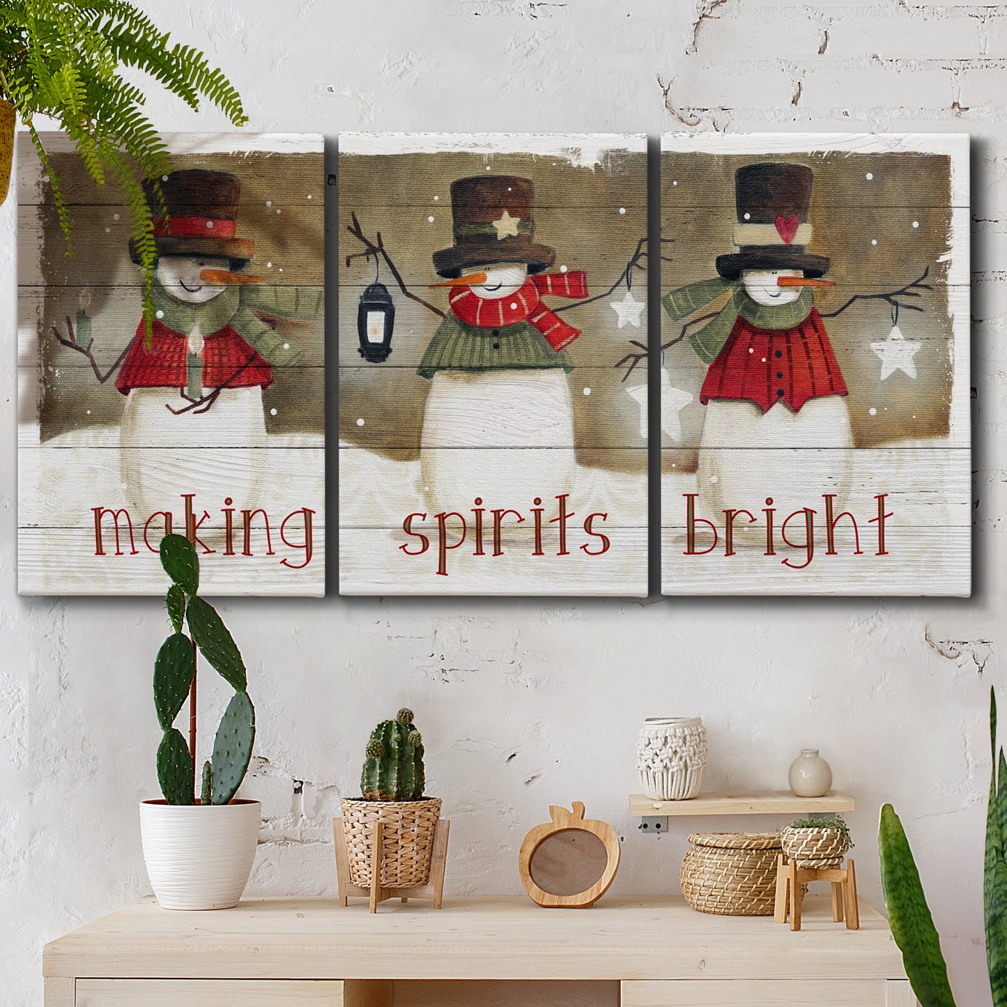 Three-panel canvas wall art featuring misty harbor sunrise with boats, displayed in a boho-chic entryway above a console table.