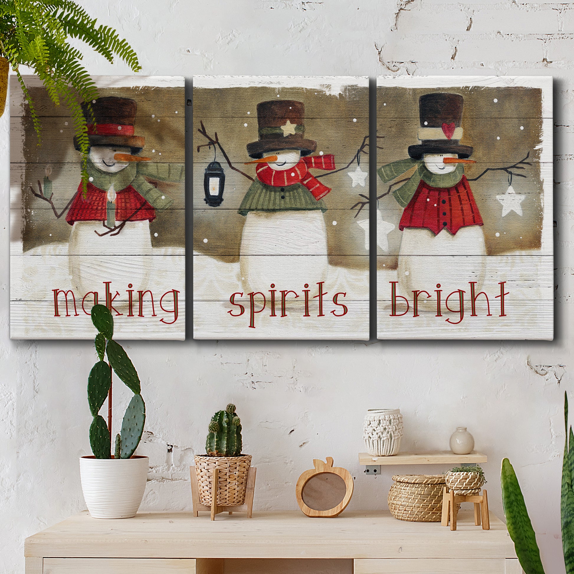 Three-panel canvas wall art featuring misty harbor sunrise with boats, displayed in a boho-chic entryway above a console table.