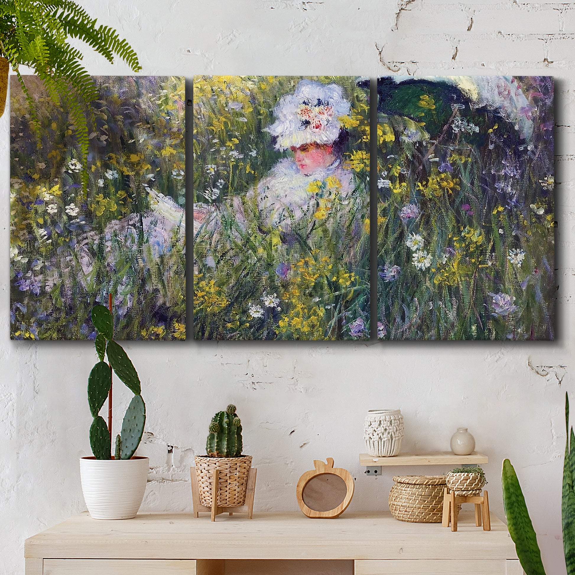 Three-panel canvas wall art featuring woman walking with parasol, displayed in a boho-chic entryway above a console table.