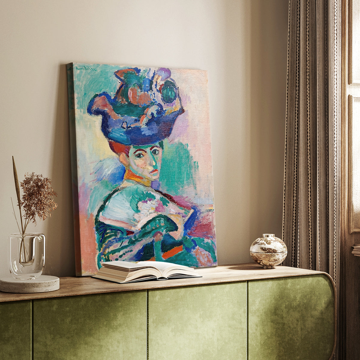 Canvas art print of a stylized face with vibrant tones and loose brushwork styled in a home decor setting.