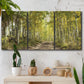 Three-panel canvas wall art featuring tree lined forest road photograph, displayed in a boho-chic entryway above a console table.