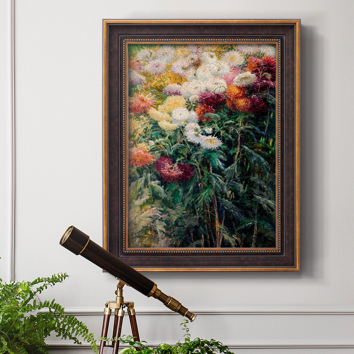 Impressionist garden floral painting by Gustave Caillebotte in an ornate bronzed mahogany wood frame displayed in a light-toned interior setting.
