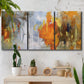 Three-panel canvas wall art featuring abstract warm sunset tones, displayed in a boho-chic entryway above a console table.