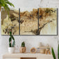 Three-panel canvas wall art featuring muted abstract with metallic gold accents, displayed in a boho-chic entryway above a console table.