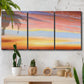 Three-panel canvas wall art featuring glowing sunset sky over landscape, displayed in a boho-chic entryway above a console table.