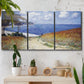 Three-panel canvas wall art featuring coastal path leading to sea, displayed in a boho-chic entryway above a console table.