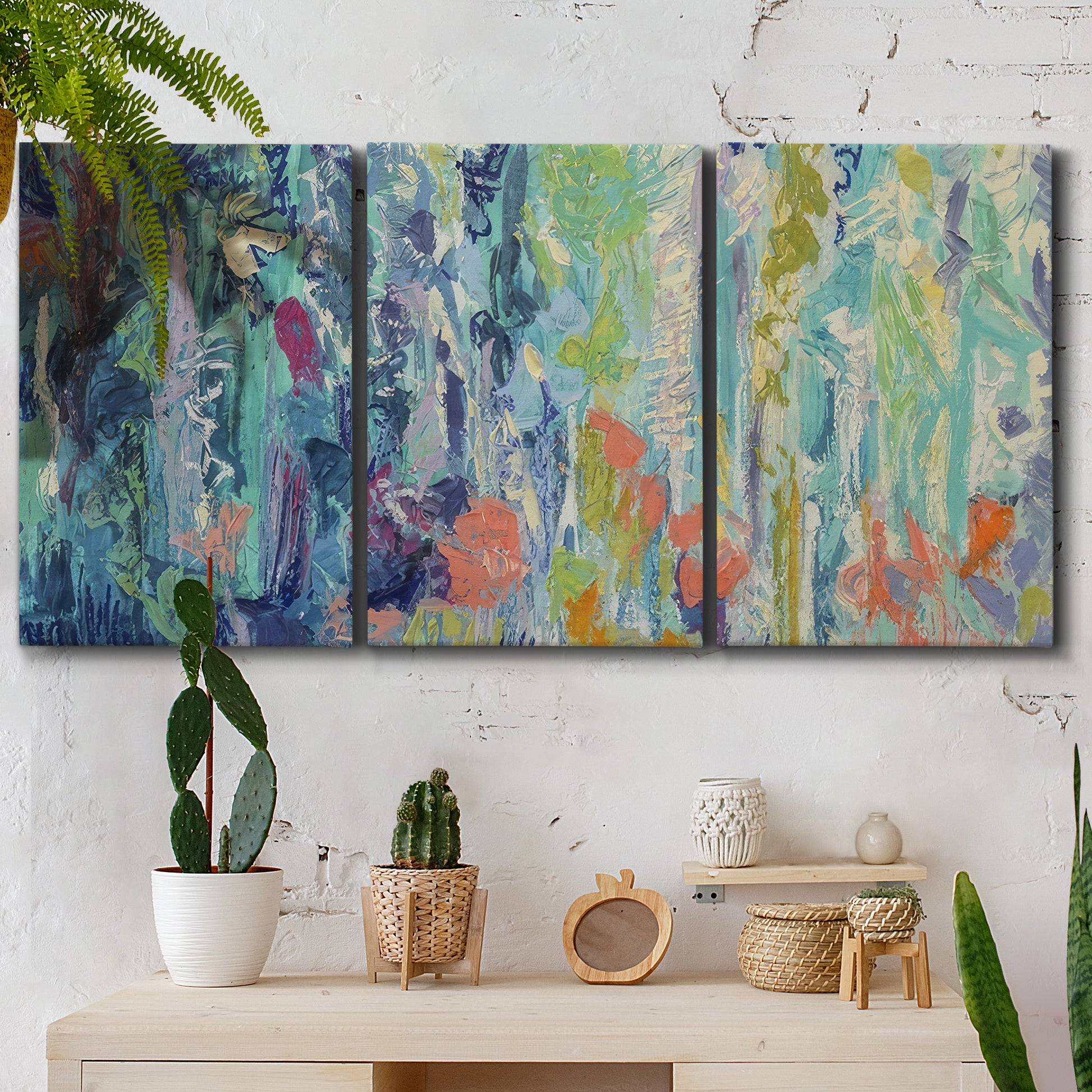 Three-panel canvas wall art featuring abstract rainfall with butterfly forms, displayed in a boho-chic entryway above a console table.