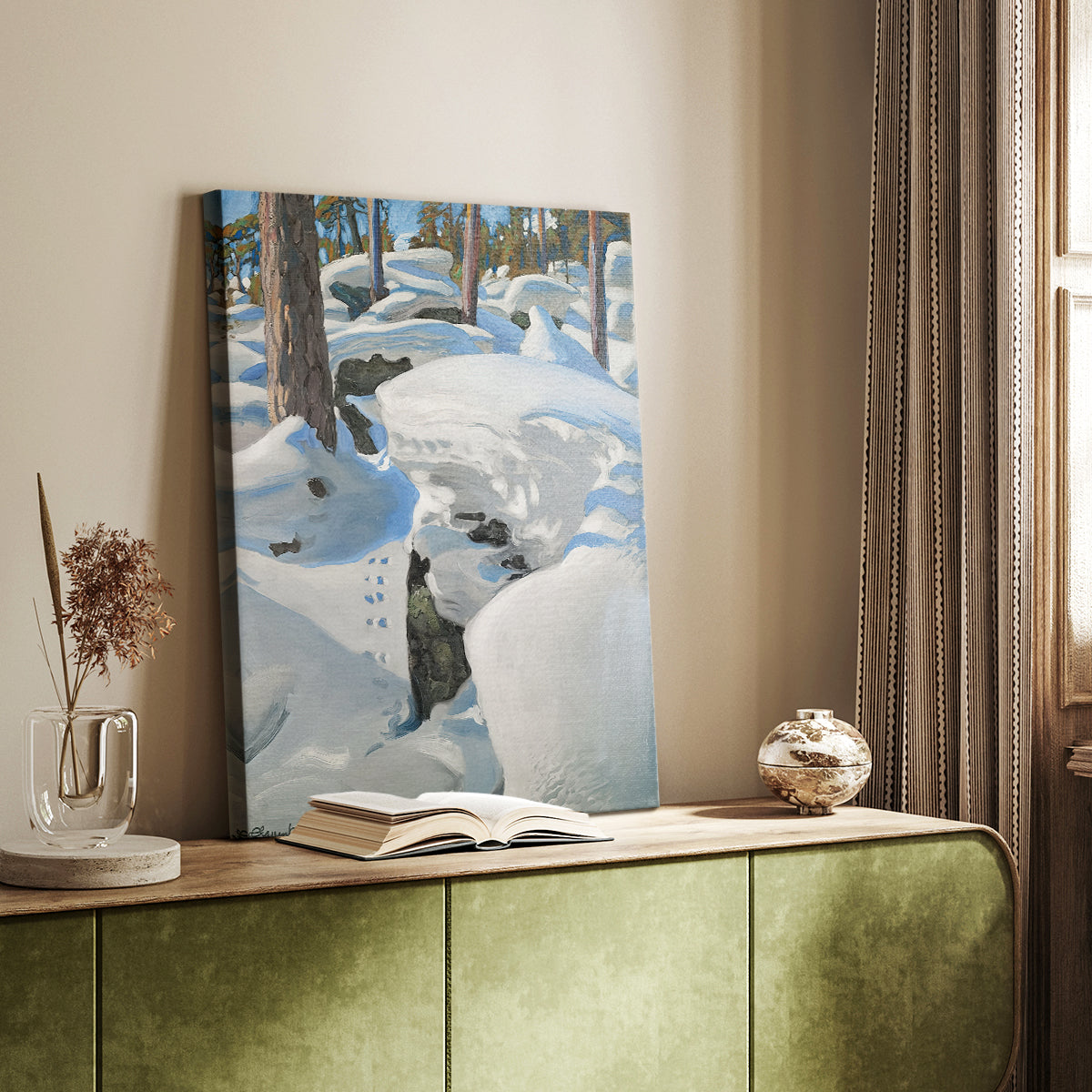 Canvas art print of a quiet winter landscape with footprints winding through a snow-covered forest styled in a home decor setting.