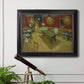 Impressionist interior of a night café by Vincent van Gogh in an ornate black frame with gilded inner detail displayed in a light-toned interior setting.