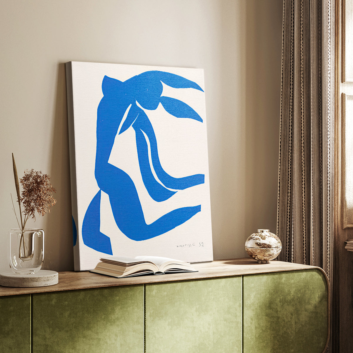 Canvas art print of a stylized figure with simplified lines and vivid color blocks styled in a home decor setting.