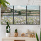 Three-panel canvas wall art featuring vintage poppy filled valley, displayed in a boho-chic entryway above a console table.
