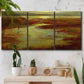 Three-panel canvas wall art featuring coastal shoreline with warm light, displayed in a boho-chic entryway above a console table.