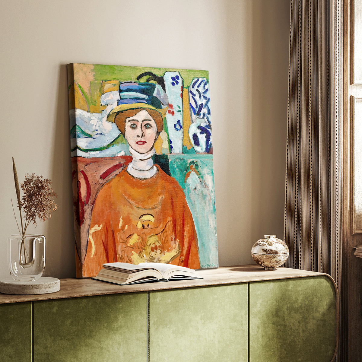 Canvas art print of a stylized face with vivid tones and simplified features styled in a home decor setting.