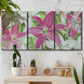 Three-panel canvas wall art featuring pink and white lilies in bloom, displayed in a boho-chic entryway above a console table.