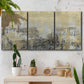 Three-panel canvas wall art featuring gold toned abstract horizon, displayed in a boho-chic entryway above a console table.