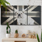 Three-panel canvas wall art featuring black and white animal collage, displayed in a boho-chic entryway above a console table.