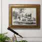 Classical pastoral landscape artwork by Nicolas Berchem in an ornate vintage gold frame displayed in a light-toned interior setting.
