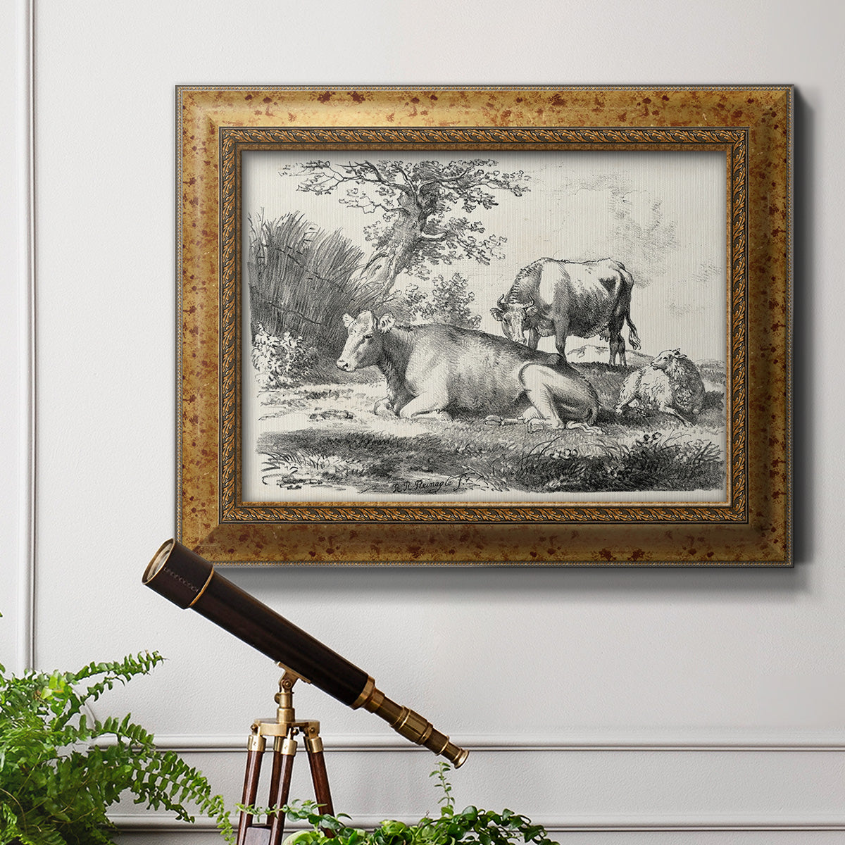 Classical pastoral landscape artwork by Nicolas Berchem in an ornate vintage gold frame displayed in a light-toned interior setting.