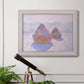 Impressionist winter haystack scene with sunlight by Claude Monet in an ornate weathered white frame displayed in a light-toned interior setting.