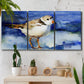 Three-panel canvas wall art featuring shorebirds standing in shallow water, displayed in a boho-chic entryway above a console table.