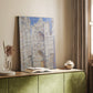 Canvas art print of an architectural study with textured brushwork and light effects styled in a home decor setting.