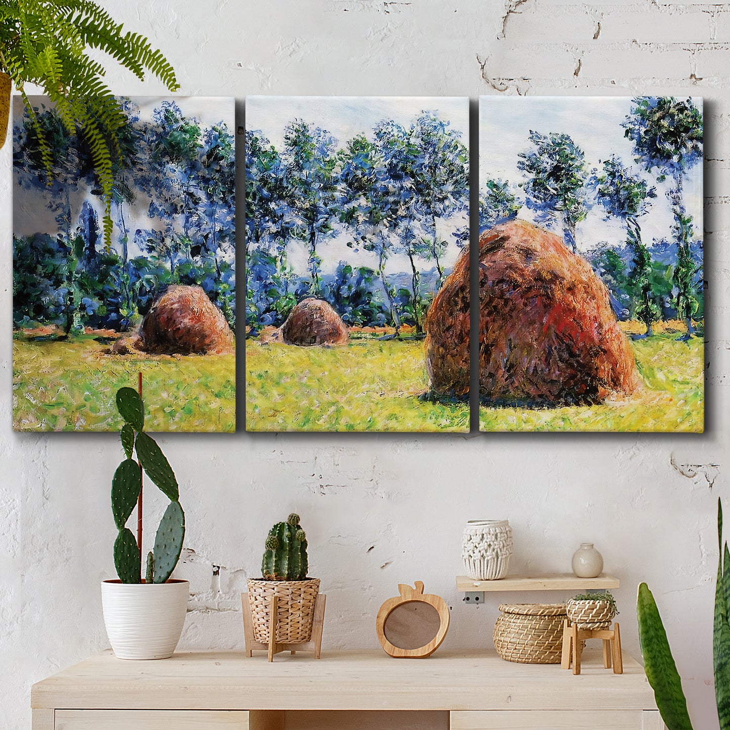 Three-panel canvas wall art featuring harvested grainstacks in field, displayed in a boho-chic entryway above a console table.