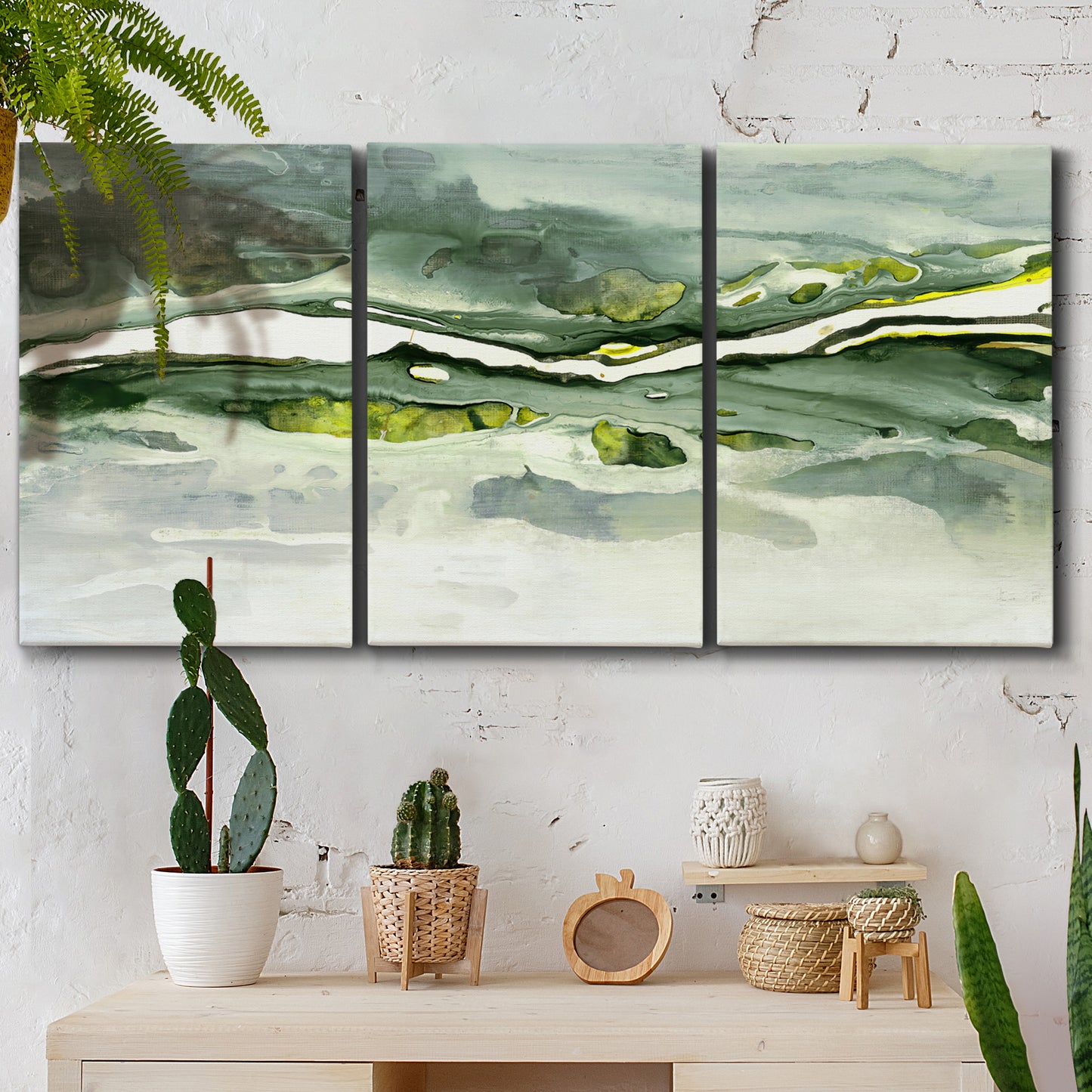 Three-panel canvas wall art featuring abstract passage of time composition, displayed in a boho-chic entryway above a console table.