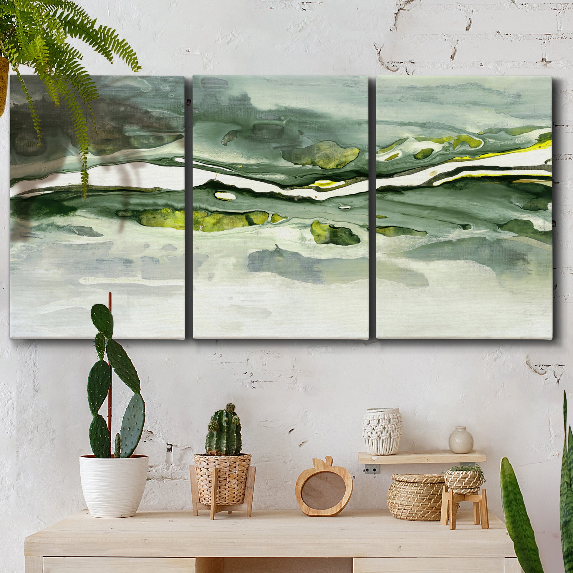 Three-panel canvas wall art featuring abstract passage of time composition, displayed in a boho-chic entryway above a console table.