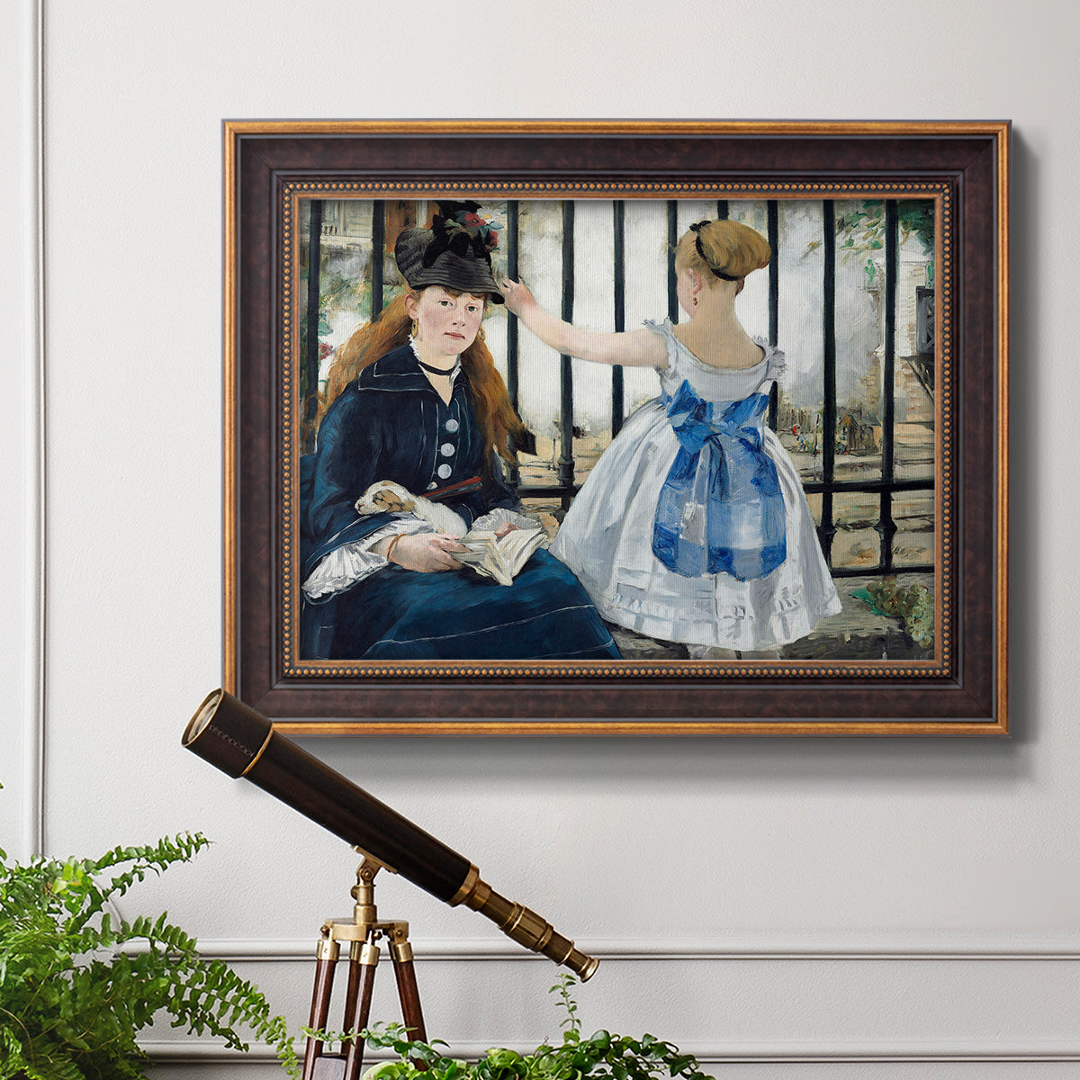 Impressionist urban scene near a railway by Édouard Manet in an ornate bronzed mahogany wood frame displayed in a light-toned interior setting.
