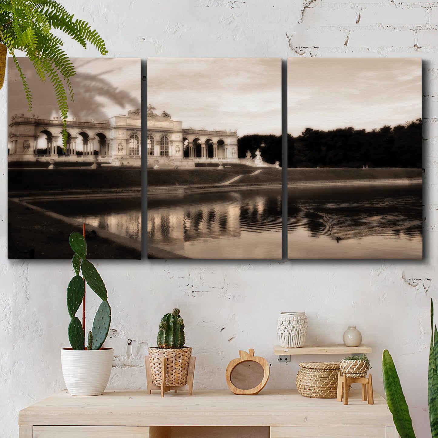 Three-panel canvas wall art featuring monochrome historic pavilion photograph, displayed in a boho-chic entryway above a console table.