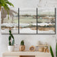 Three-panel canvas wall art featuring layered turquoise and earth tones abstract, displayed in a boho-chic entryway above a console table.