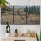Three-panel canvas wall art featuring western wildlife standing in grassland, displayed in a boho-chic entryway above a console table.