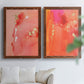 Set of two maple barnwood framed canvas prints depicting translucent warm washes, drips, and scattered metallic accents arranged across two complementary compositions above a sofa in a bright living space.