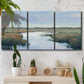 Three-panel canvas wall art featuring coastal plain with layered horizon, displayed in a boho-chic entryway above a console table.