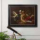Classical religious painting of Saint Jerome with an angel by Simon Vouet in an ornate black frame with gilded inner detail displayed in a light-toned interior setting.