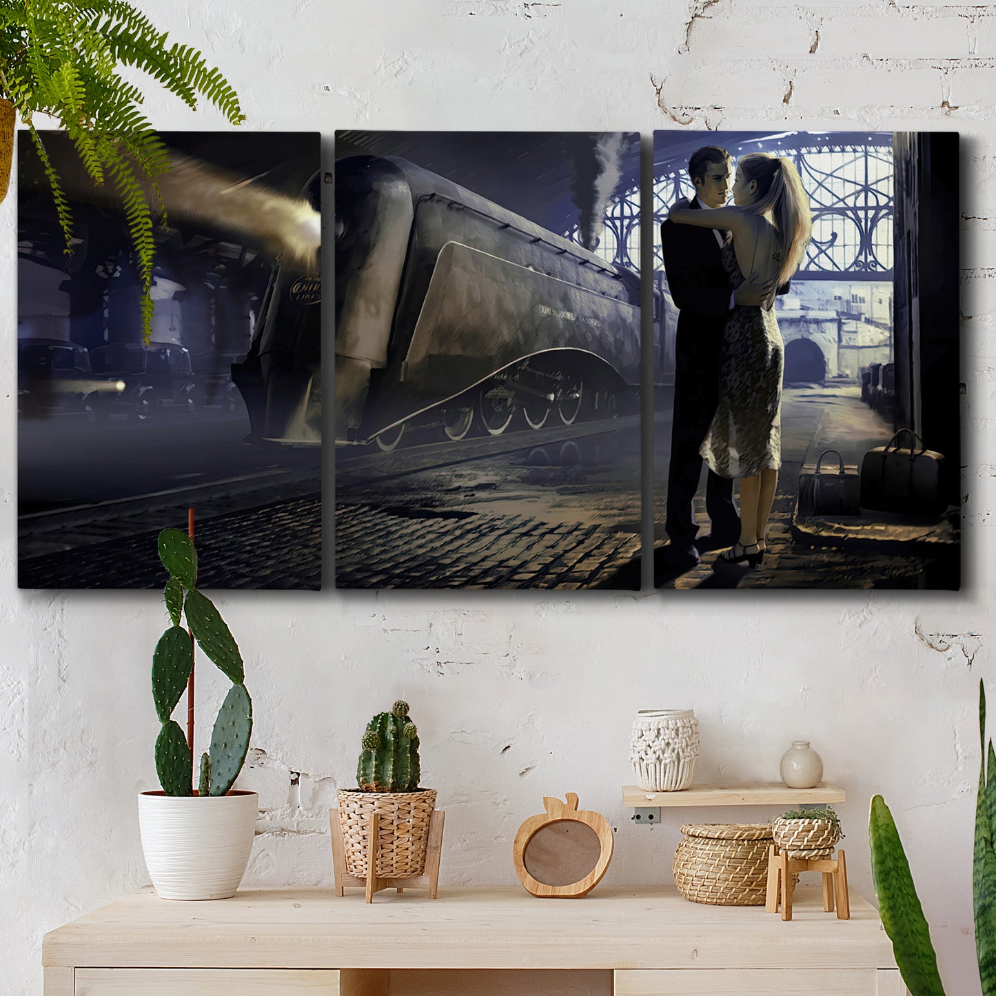 Three-panel canvas wall art featuring couple kissing at train station, displayed in a boho-chic entryway above a console table.